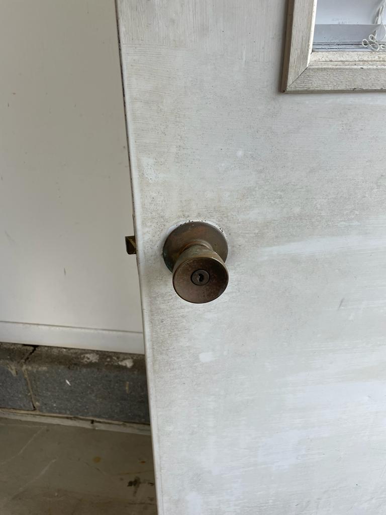 before lock installed only door knob on door